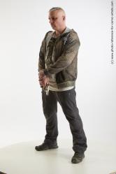 Yury Foghting Pose With Gun